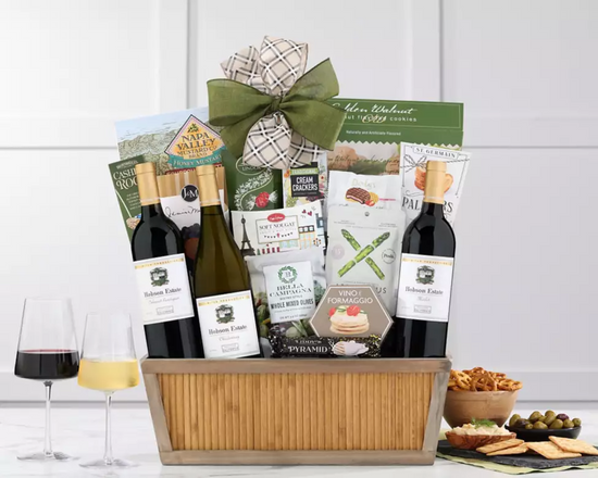 Gift basket with Hobson Estates wine bottles, snacks, and a bow on a white background Gift basket with Hobson Estates wine bottles, snacks, and a bow on a white background