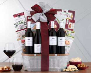 Wine gift basket with decadent assortment of snacks Wine gift basket with decadent assortment of snacks