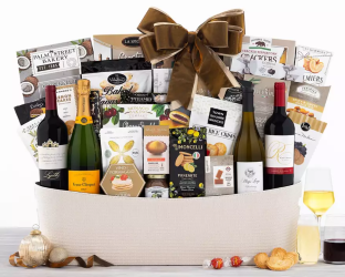 Luxurious Gift basket with wine,champagne  snacks, and a bow  Luxurious Gift basket with wine,champagne  snacks, and a bow