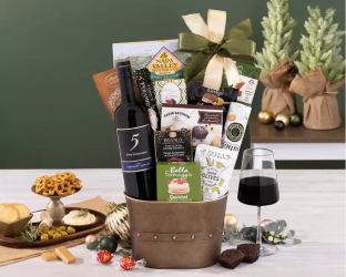 Gift basket with wine, cheese, and snacks