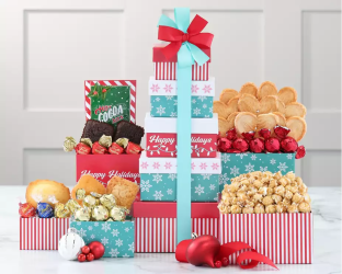 Decorative gift tower with various snacks and treats