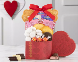 Gift basket with a red ribbon and heart-shaped decorations