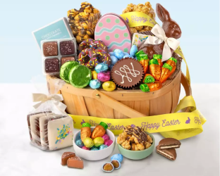 Easter basket filled with treats, eggs, and a chocolate bunny on a light blue background.