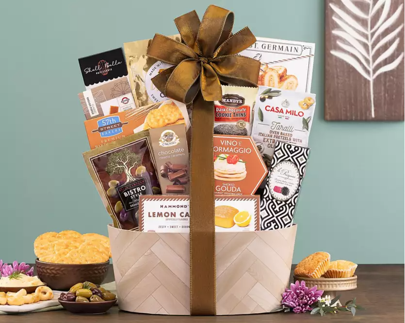 Metal gift basket with a variety of snacks and treats