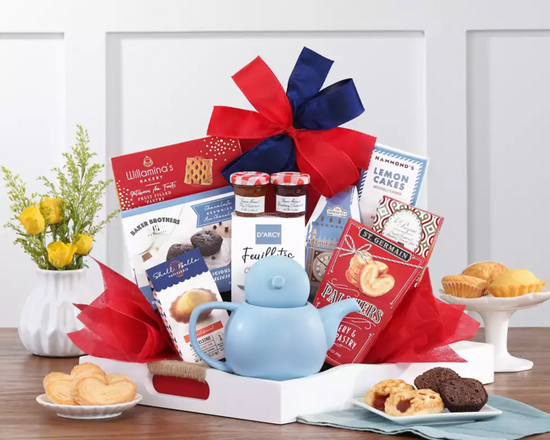 White wooden tray with powder blue teapot, jams, cookies, cakes White wooden tray with powder blue teapot, jams, cookies, cakes
