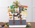 Gift basket with snacks and treats in a fabric container
