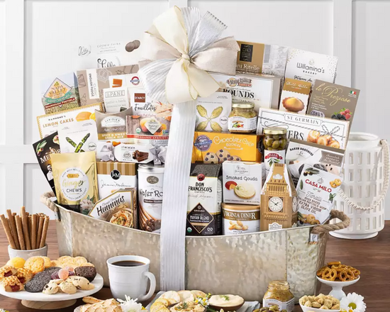 Grand gourmet gift basket with various snacks in a silver metal container Grand gourmet gift basket with various snacks in a silver metal container