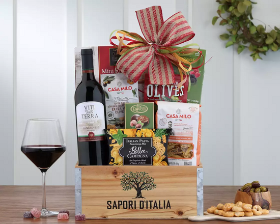 Italian wine basket with red wine and teats Italian wine basket with red wine and teats