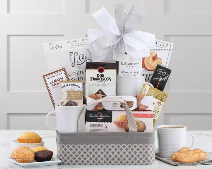 Grey fabric basket with coffees, cookies and white ceramic mug