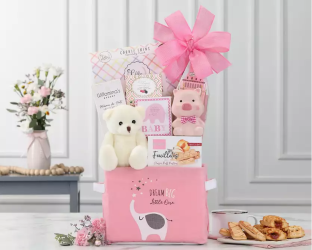 Baby pink Gift basket with teddy bears, cookies, and a pink bow 