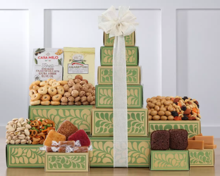 Decorative gift tower with various snacks and treats 
