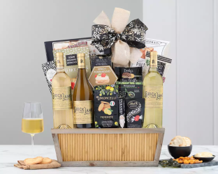 Gourmet gift basket with wine, cheese, and snacks 