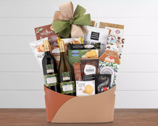 Gift basket with various items including wine, cheese, and snacks 