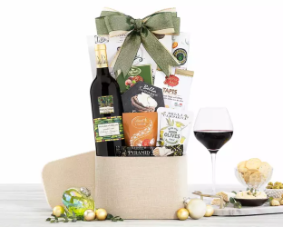 Gift basket with wine, cheese, and snacks 