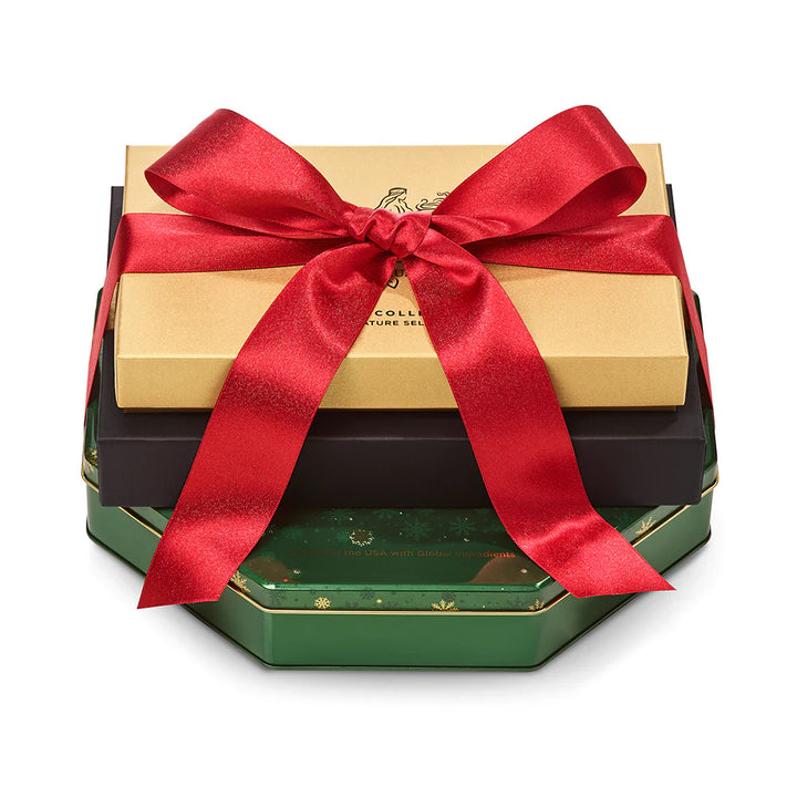 Stack of hexagonal gift boxes with a red ribbon 