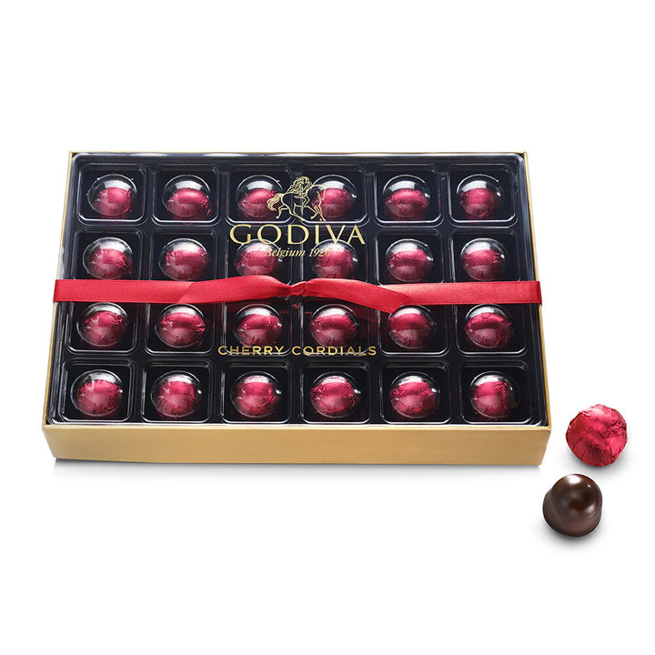 Godiva Cherry Cordials chocolate truffles in a box with a red ribbon 