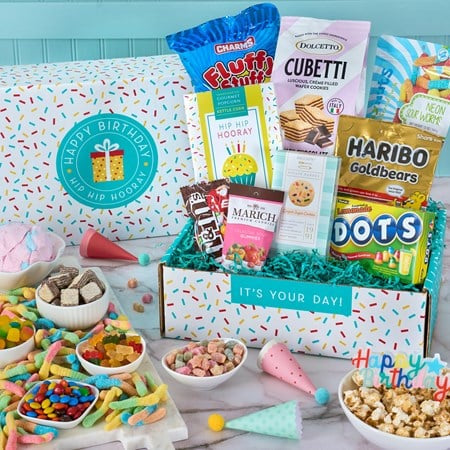Birthday-themed gift box with snacks and candies 