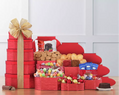 Assorted gift baskets and candies displayed in a gift tower