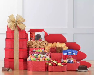 Assorted gift baskets and candies displayed in a gift tower