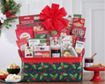 Gift basket with a red bow filled with snacks and treats 