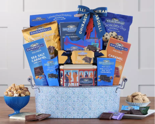Gift basket with various snacks including chocolate bars and cookies 