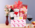 Gift basket with wine, teddy bear, and snacks for Valentine’s Day 