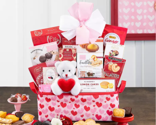 Valentine's Day gift basket with a teddy bear, cookies, and other treats 