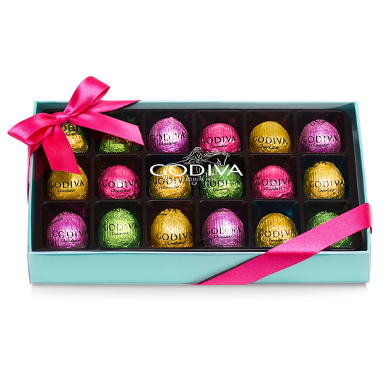 Box of Godiva chocolates with a pink ribbon 