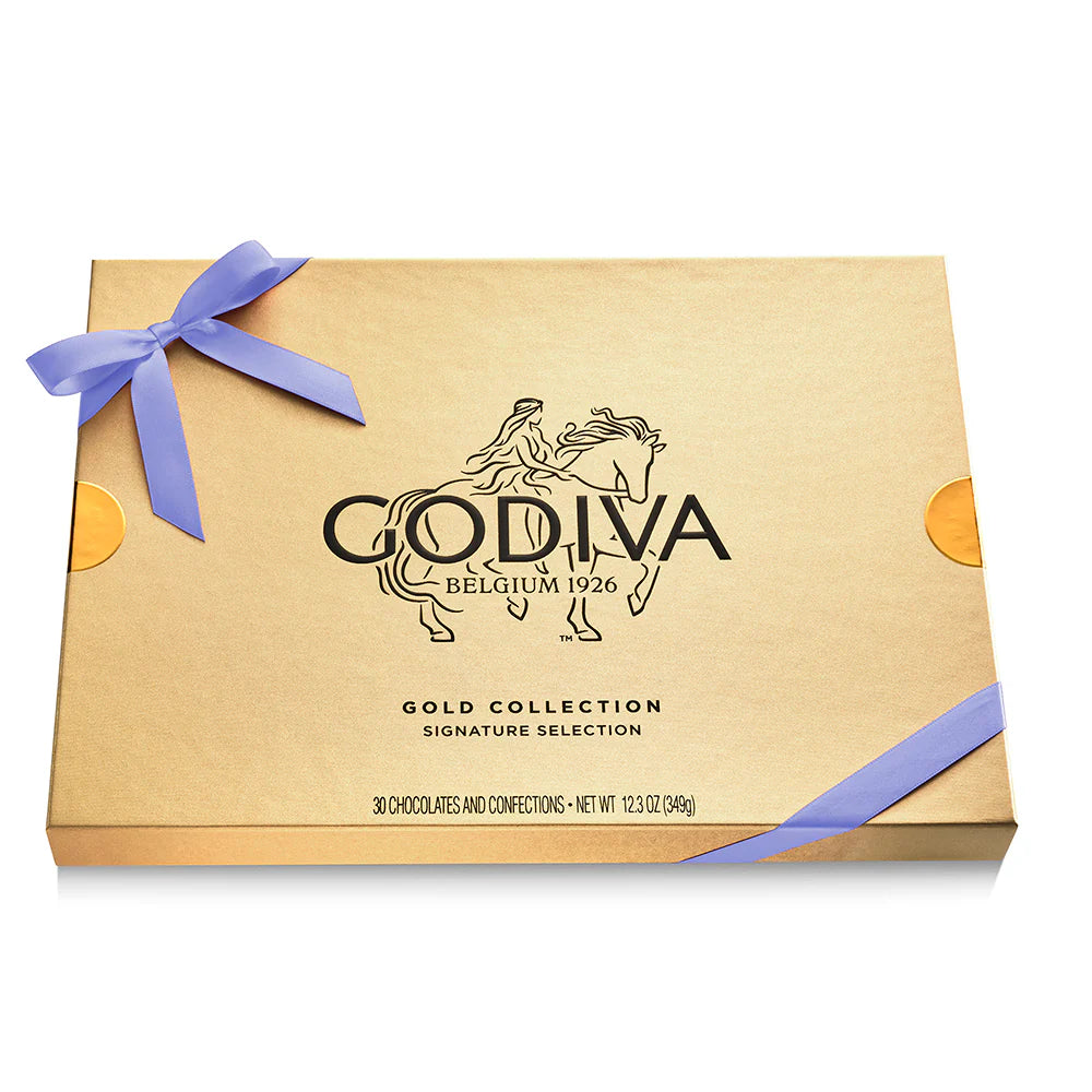 Godiva Gold Collection chocolate box with a purple ribbon on a white background