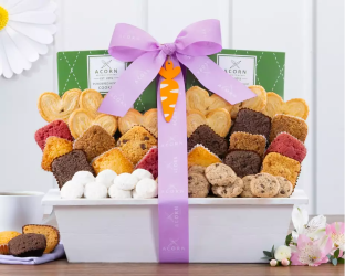 Gift basket with assorted cookies and a purple ribbon on a white background