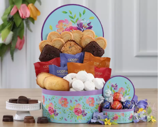 Decorative gift basket with pastries, candies,