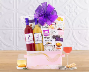 Gourmet gift basket with wine, cheese, and snacks 