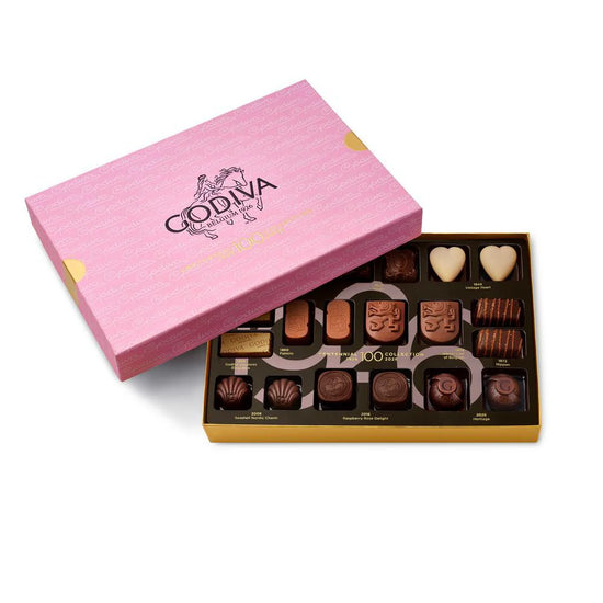 Godiva chocolate box with a pink lid on a white background
