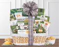 Wicker gift basket with various products including snacks, cakes, cookies,crackers and chocolate