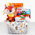Baby gift basket with blanket, books and more.